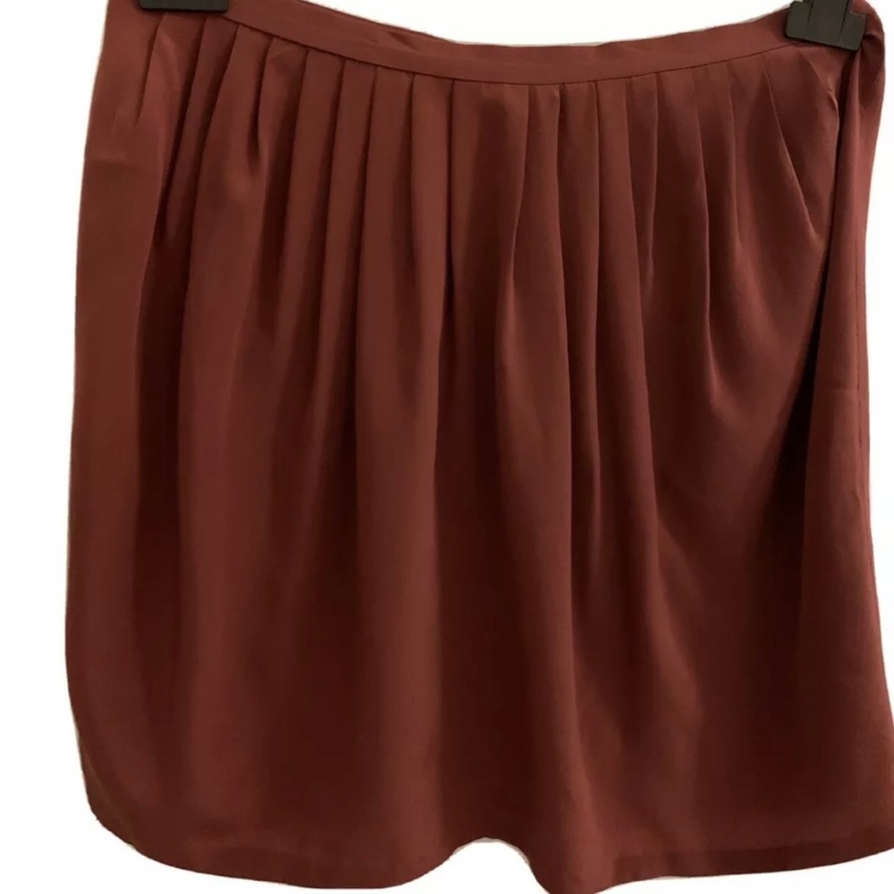 BRUCE II mini skirt in copper silk, zip in back. Unlined. W 28.5”, 16” l.